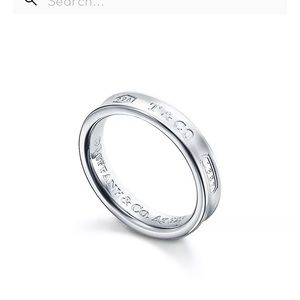 NEVER WORN TIFFANY RING. size 7